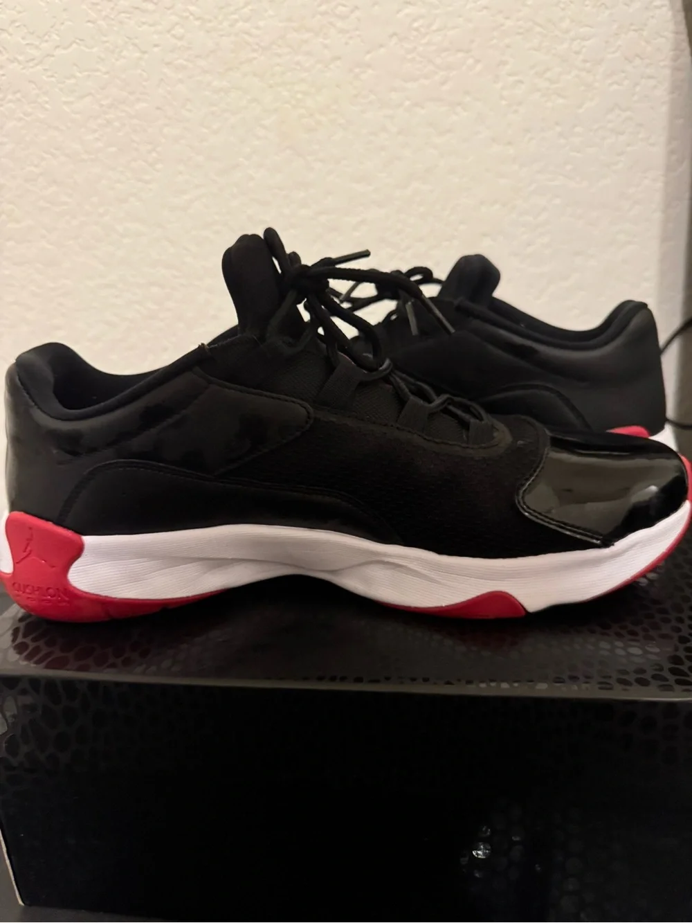 Jordan 11 CMFT Bred Black and Red Low-Top Sneakers